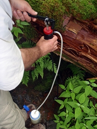 Chef Glenn using MSR Sweetwater Backpacking Filter