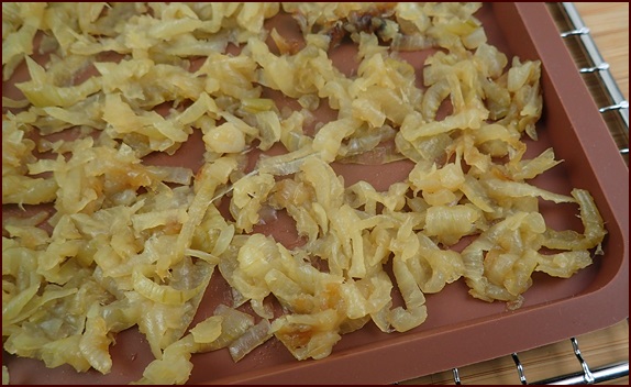 Caramelized onions on dehydrator tray.