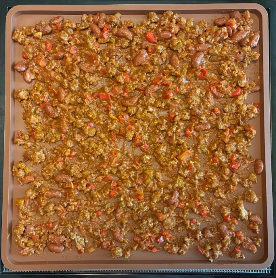 Chili on silicone dehydrator tray. Chili on silicone dehydrator tray.