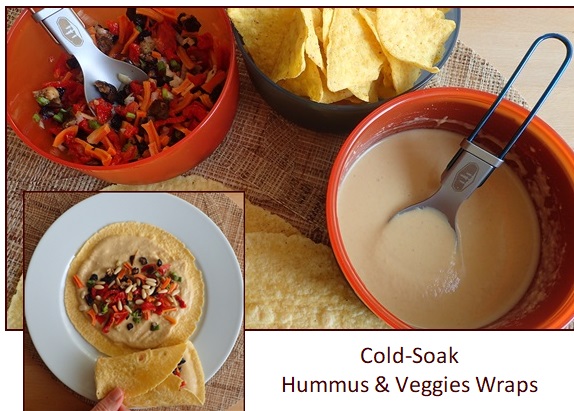 Making tortilla wraps with hummus and vegetables.