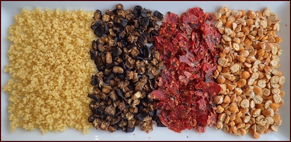 Pearl couscous, eggplant, stewed tomatoes and dried chickpeas.