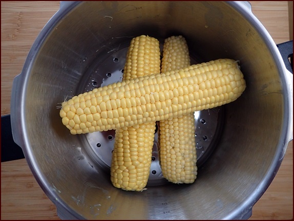 Precook corn on the cob before dehydrating it. Shown inside a pressure cooker.