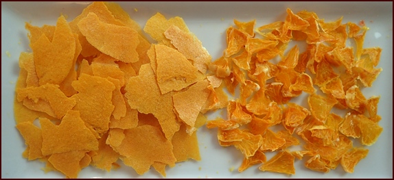 Dehydrated orange fruit leather and orange pieces.