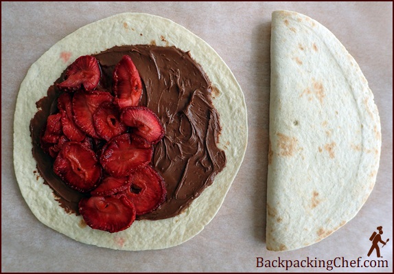 Rehydrated strawberries and Nutella chocolate spread on tortilla.