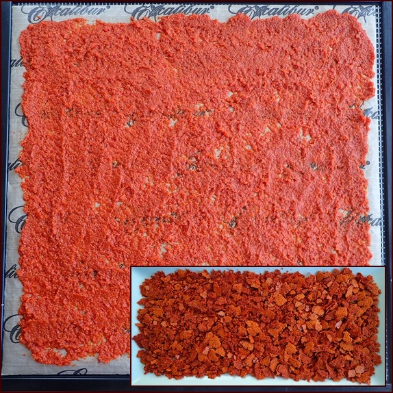 Contents of one jar of Thai Kitchen red curry paste on dehydrator tray. Crumbles by hand when dry.