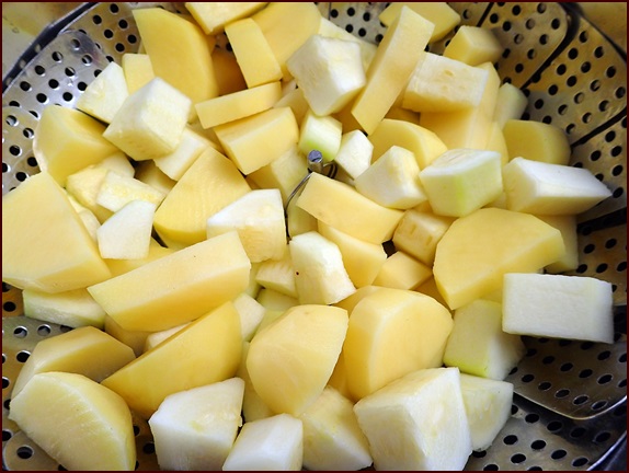 Chunked zucchini and potatoes before steaming and dehydrating into bark.