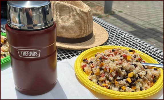 Photo shows mango salsa rice salad which was rehydrated in a thermos food jar and enjoyed for lunch on a road trip.