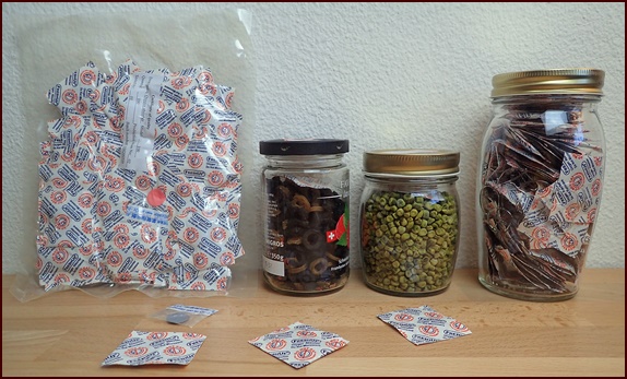 Storing dehydrated food in jars with oxygen absorbers.