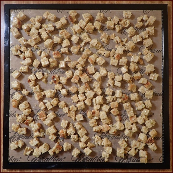 Stuffed turkey loaf cubes on Excalibur dehydrator tray.
