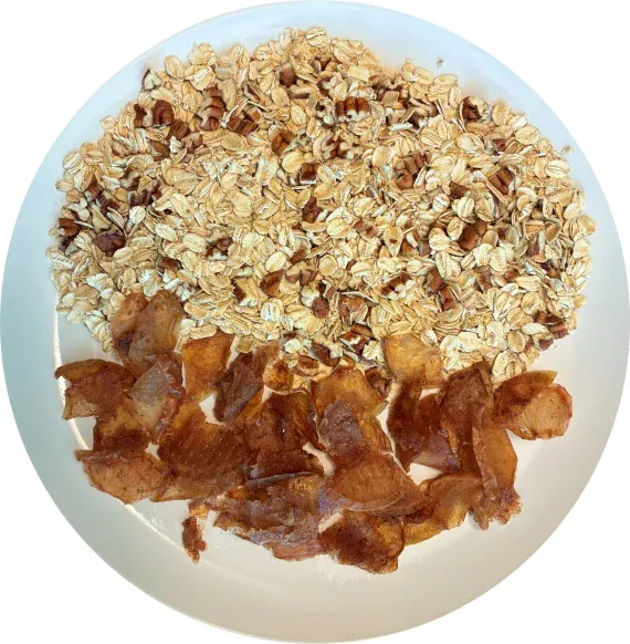 Oatmeal with baked apples and pecans. Oatmeal with baked apples and pecans.