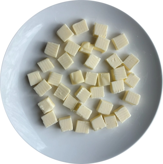 Cold, unsalted butter cut into cubes for making biscuits.