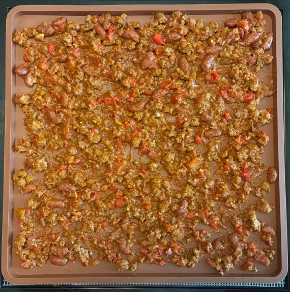 Chili on silicone dehydrator tray. Chili on silicone dehydrator tray.