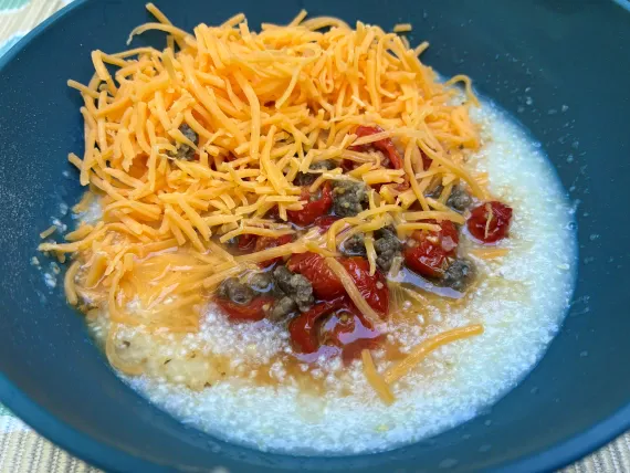 Rehydrated Grits with Beef & Tomatoes. Rehydrated Grits with Beef & Tomatoes.