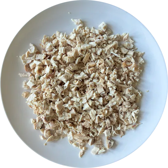 Chopped chicken for creamy chicken soup.