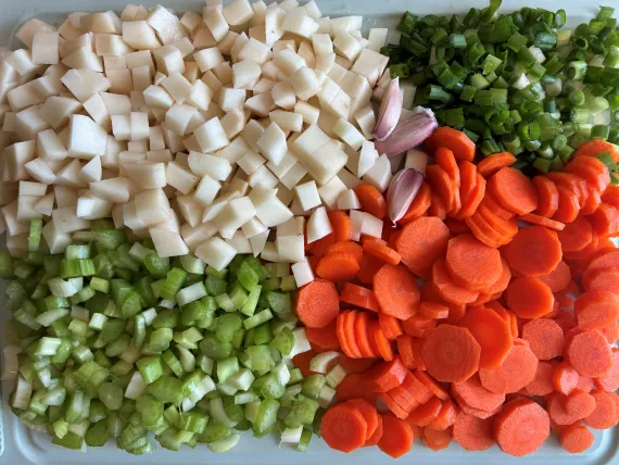 Potatoes, spring onions, celery, and carrots.