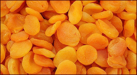 Commercially dried apricots treated with sulfur dioxide.