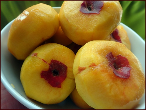 Clingstone peached, peeled before slicing and dehydrating.