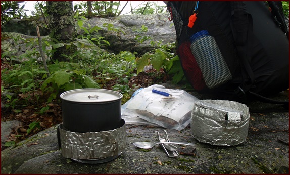 Homemade pot cozy on right.