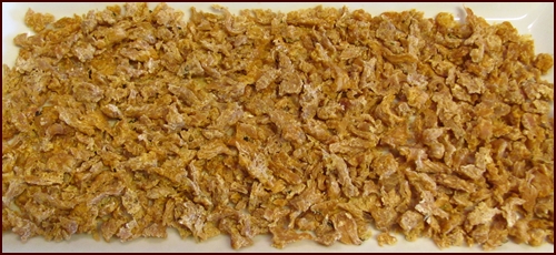 Dehydrated pressure cooked chicken. Use in meals or eat it dry as crunchy chicken jerky.