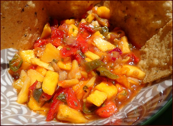 Photo shows rehydrated mango salsa with tortilla chips.