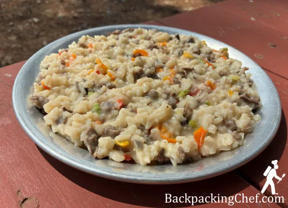 Sausage-seasoned ground beef with rice and vegetables.