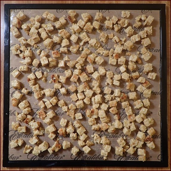 Stuffed turkey loaf cubes on Excalibur dehydrator tray.